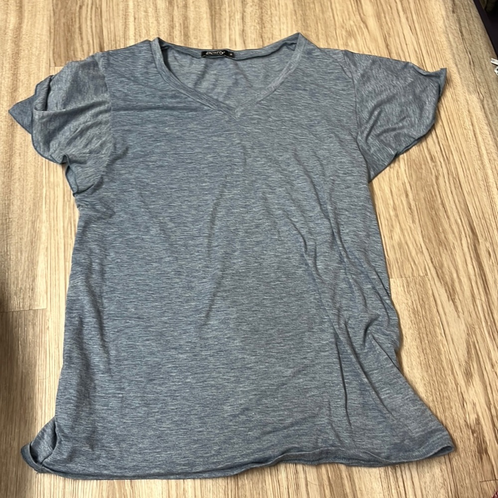 Women’s size medium blue ruffle sleeved T-shirt!